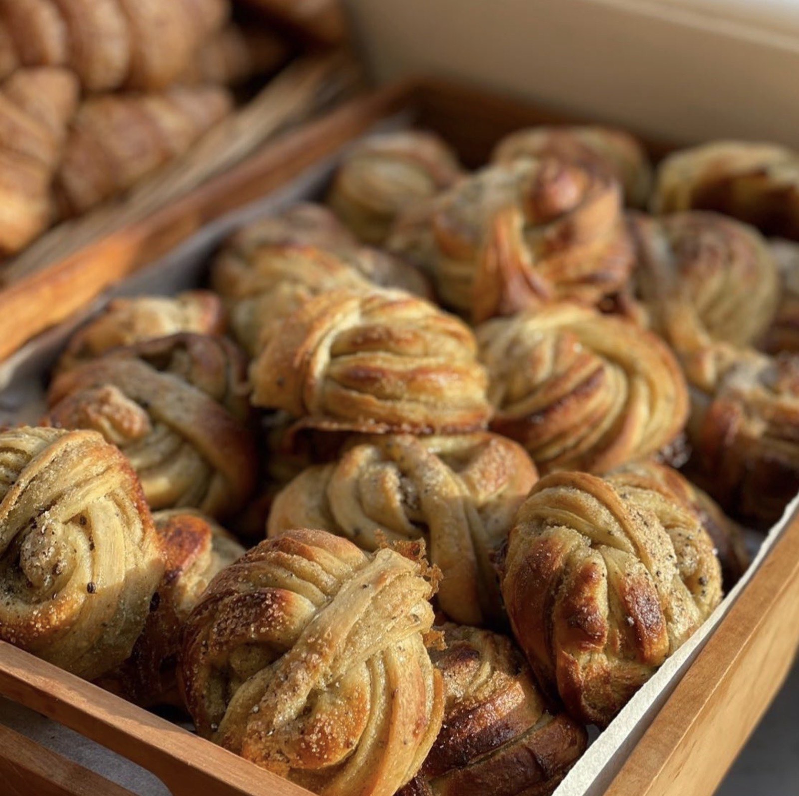 Trays of freshly baked cardamom buns at HJEM